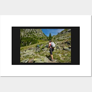 Group of hikers on a mountain trail Posters and Art